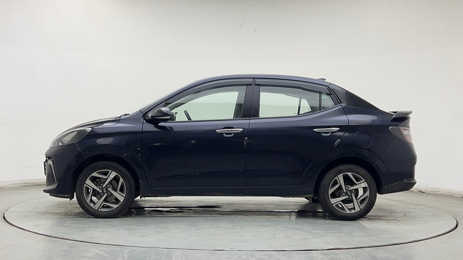 Used 2024 Hyundai Aura SX 1.2 CNG Cng Manual exterior LEFT SIDE VIEW