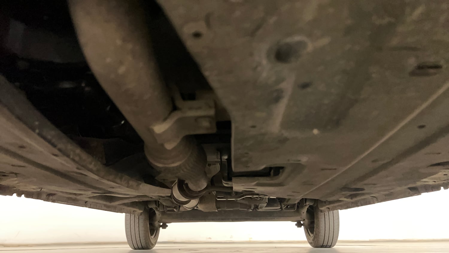 Used 2019 Mahindra KUV100 NXT K6 Plus 6 STR Petrol Manual extra FRONT LEFT UNDERBODY VIEW