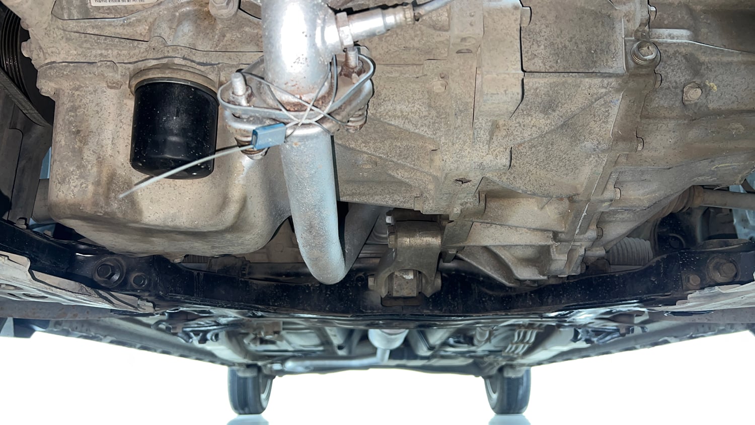 Used 2021 Maruti Suzuki XL6 Zeta MT Petrol Petrol Manual extra FRONT LEFT UNDERBODY VIEW
