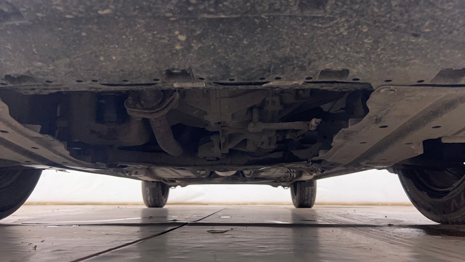 Used 2018 Maruti Suzuki Baleno Delta 1.2 Petrol Manual extra FRONT LEFT UNDERBODY VIEW