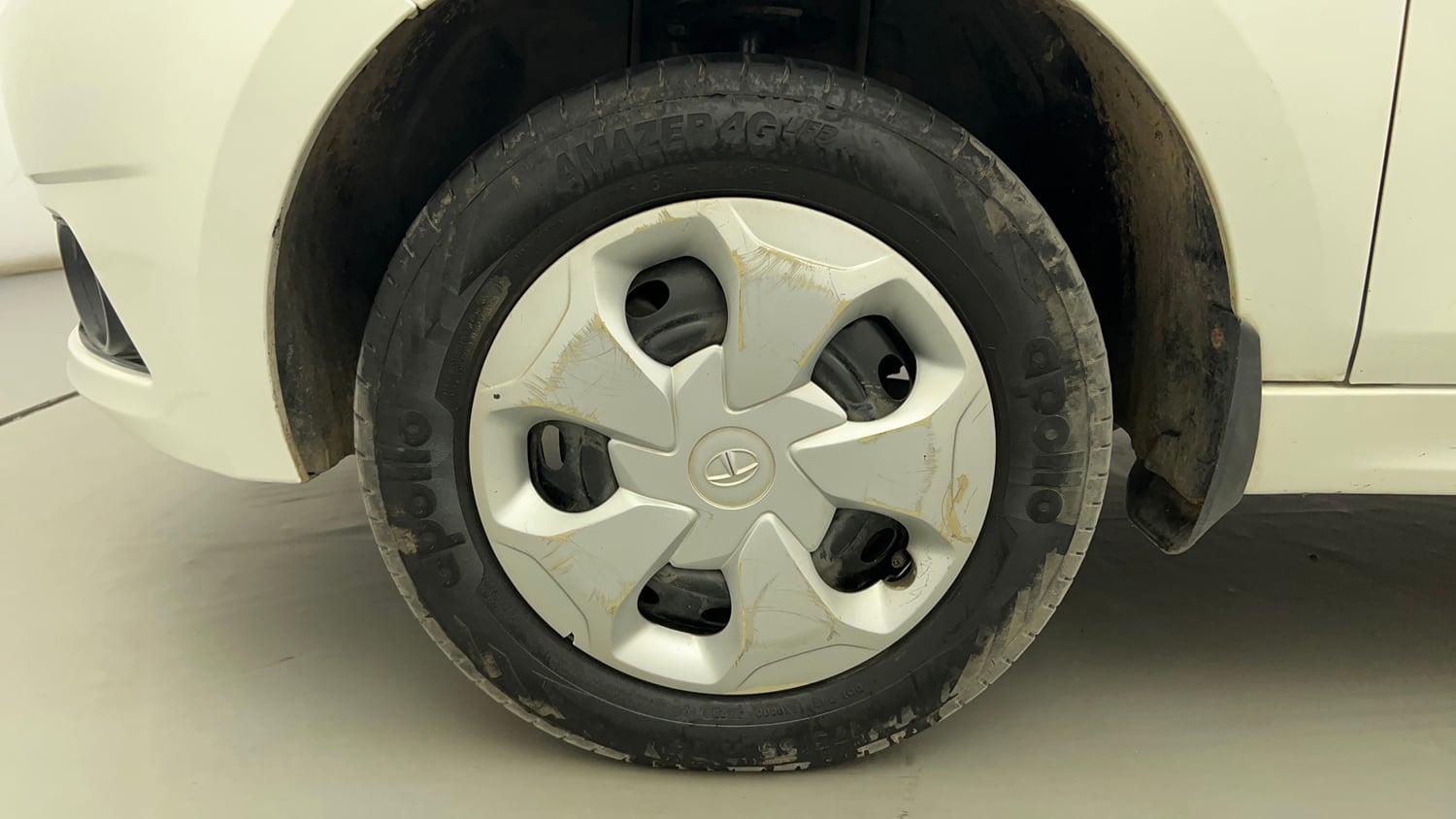 Used 2017 Tata Tiago Revotron XT Petrol Manual tyres LEFT FRONT TYRE RIM VIEW