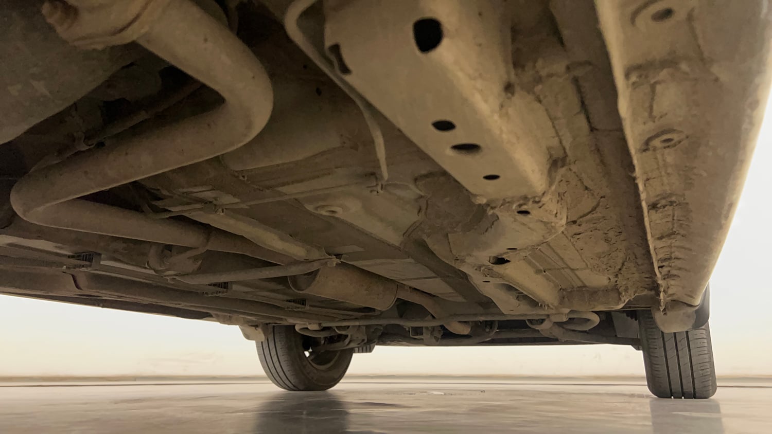 Used 2024 Tata Tigor XZ Petrol Manual extra REAR RIGHT UNDERBODY VIEW