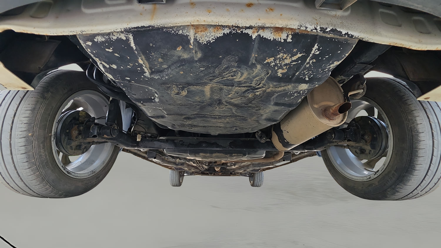 Used 2023 Tata Tigor XZ Plus Leatherette Pack Petrol Manual extra REAR RIGHT UNDERBODY VIEW
