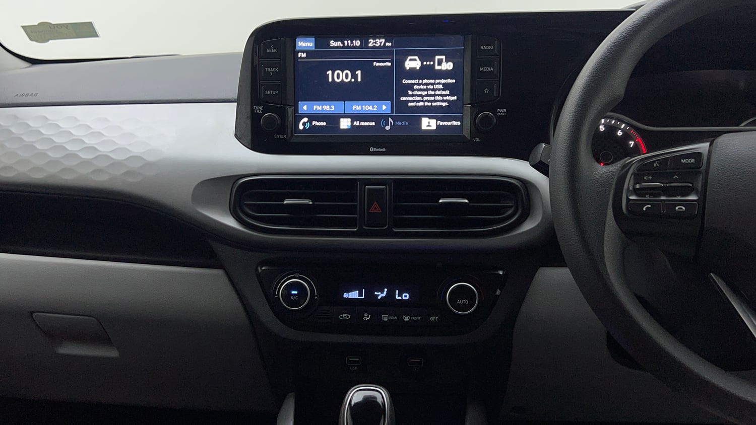 Used 2019 Hyundai Grand i10 Nios Sportz AMT 1.2 Kappa VTVT Petrol Automatic interior MUSIC SYSTEM & AC CONTROL VIEW