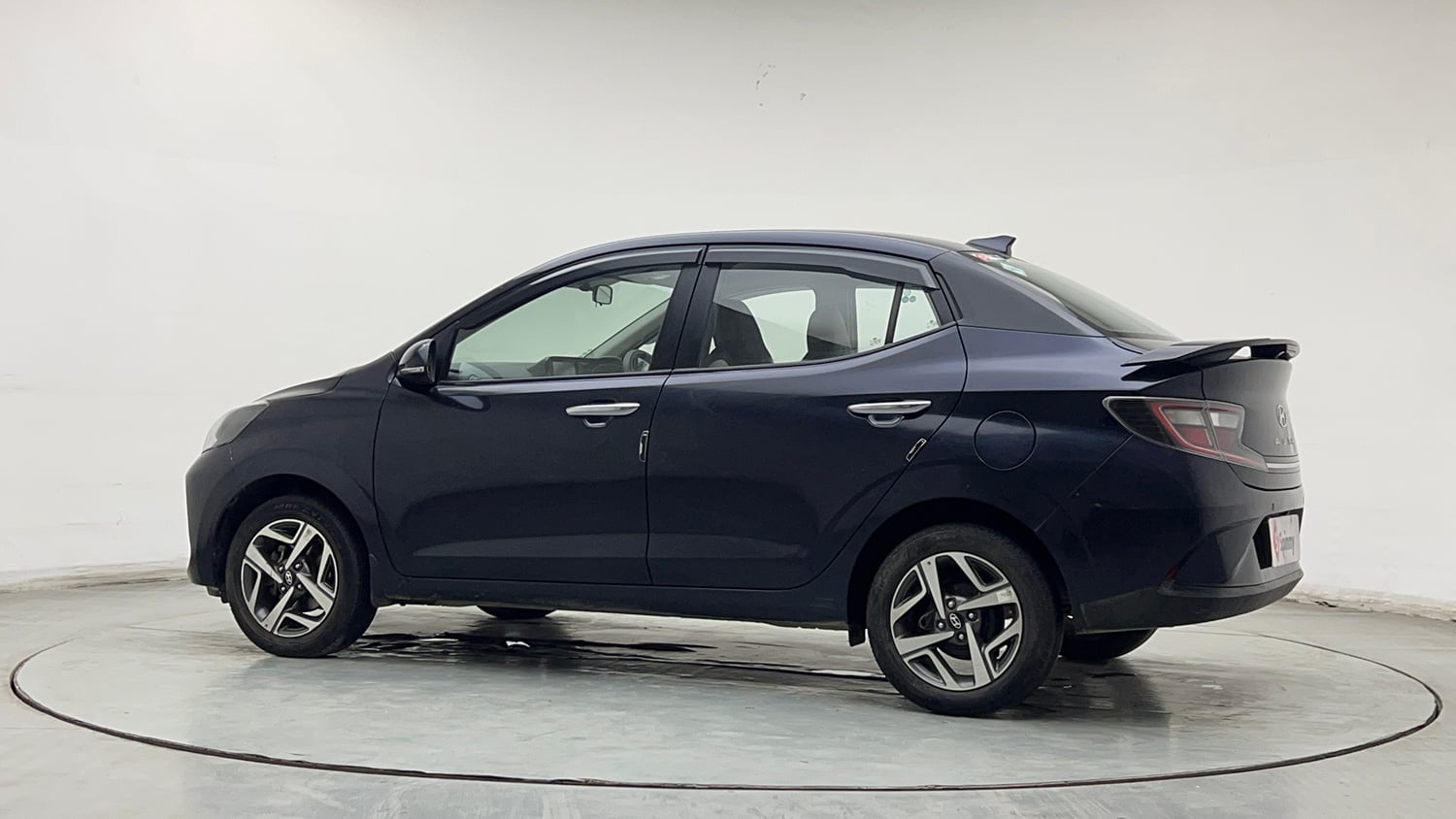 Used 2024 Hyundai Aura SX 1.2 CNG Cng Manual exterior LEFT REAR CORNER VIEW