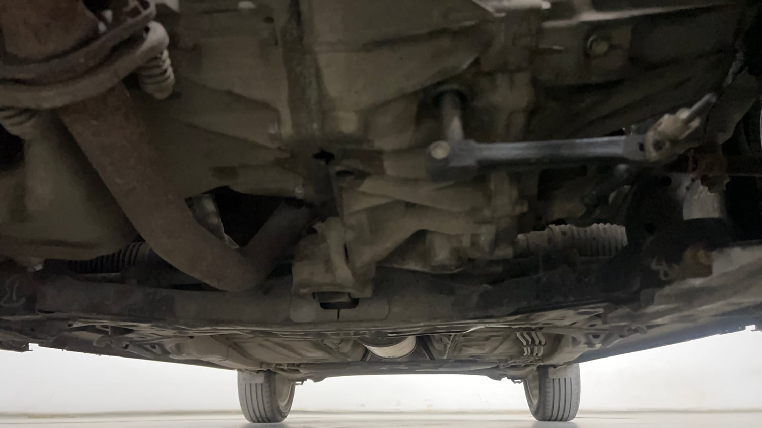 Used 2020 Maruti Suzuki Baleno Zeta Petrol Manual extra FRONT LEFT UNDERBODY VIEW