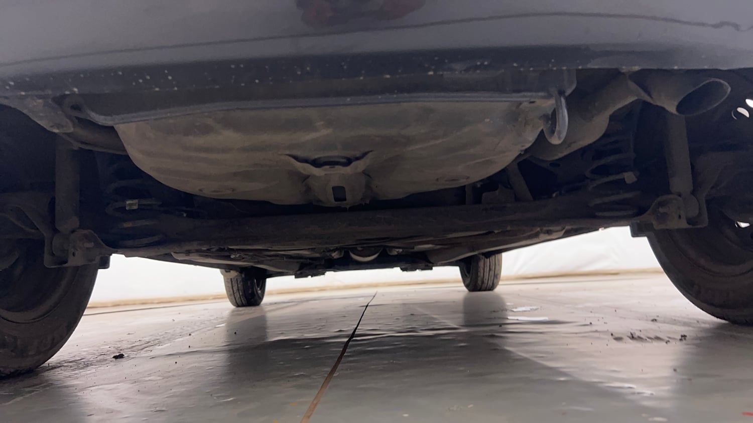 Used 2018 Maruti Suzuki Baleno Delta 1.2 Petrol Manual extra REAR UNDERBODY VIEW (TAKEN FROM REAR)