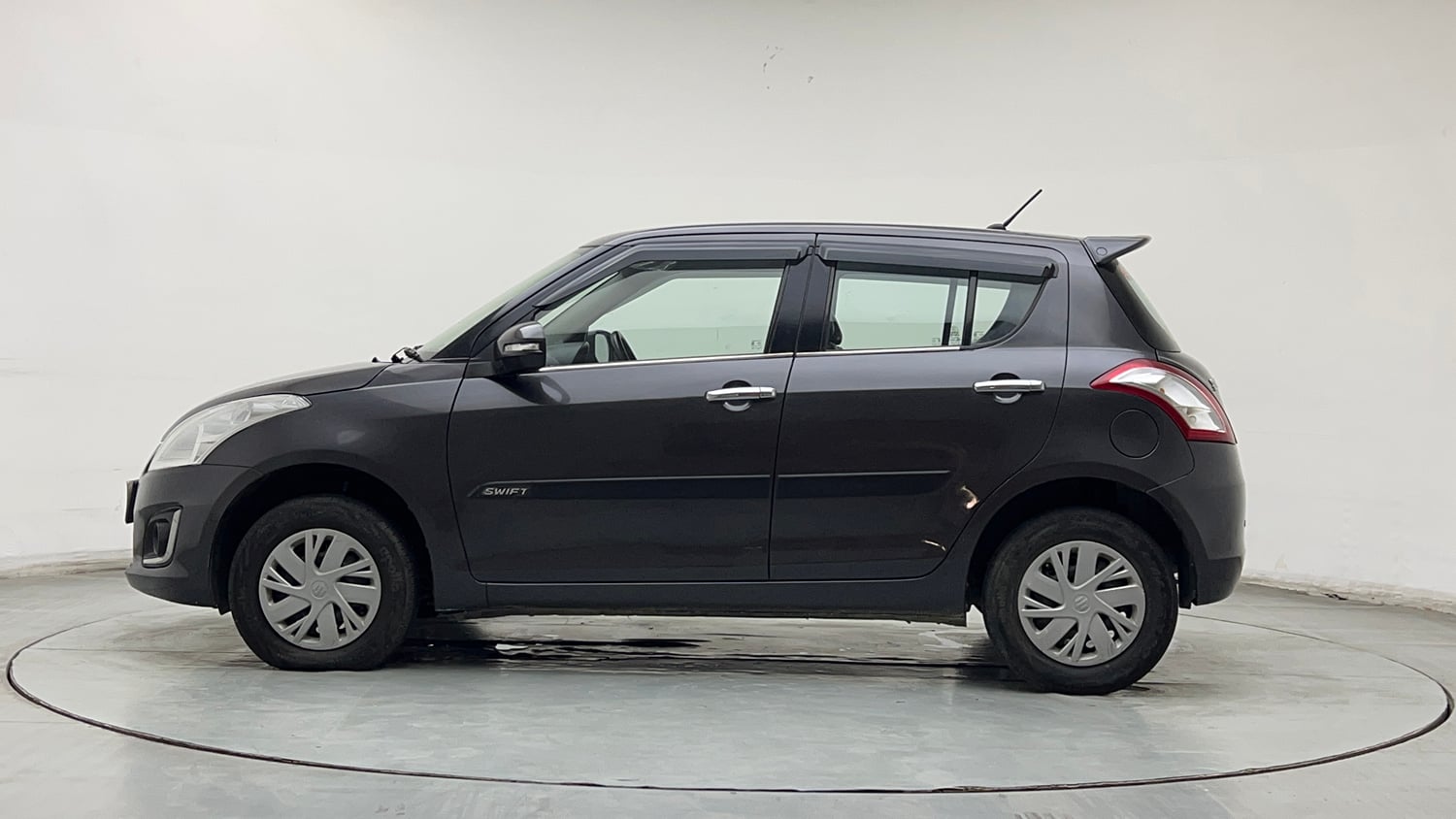 Used 2016 Maruti Suzuki Swift VXI (O) Petrol Manual exterior LEFT SIDE VIEW