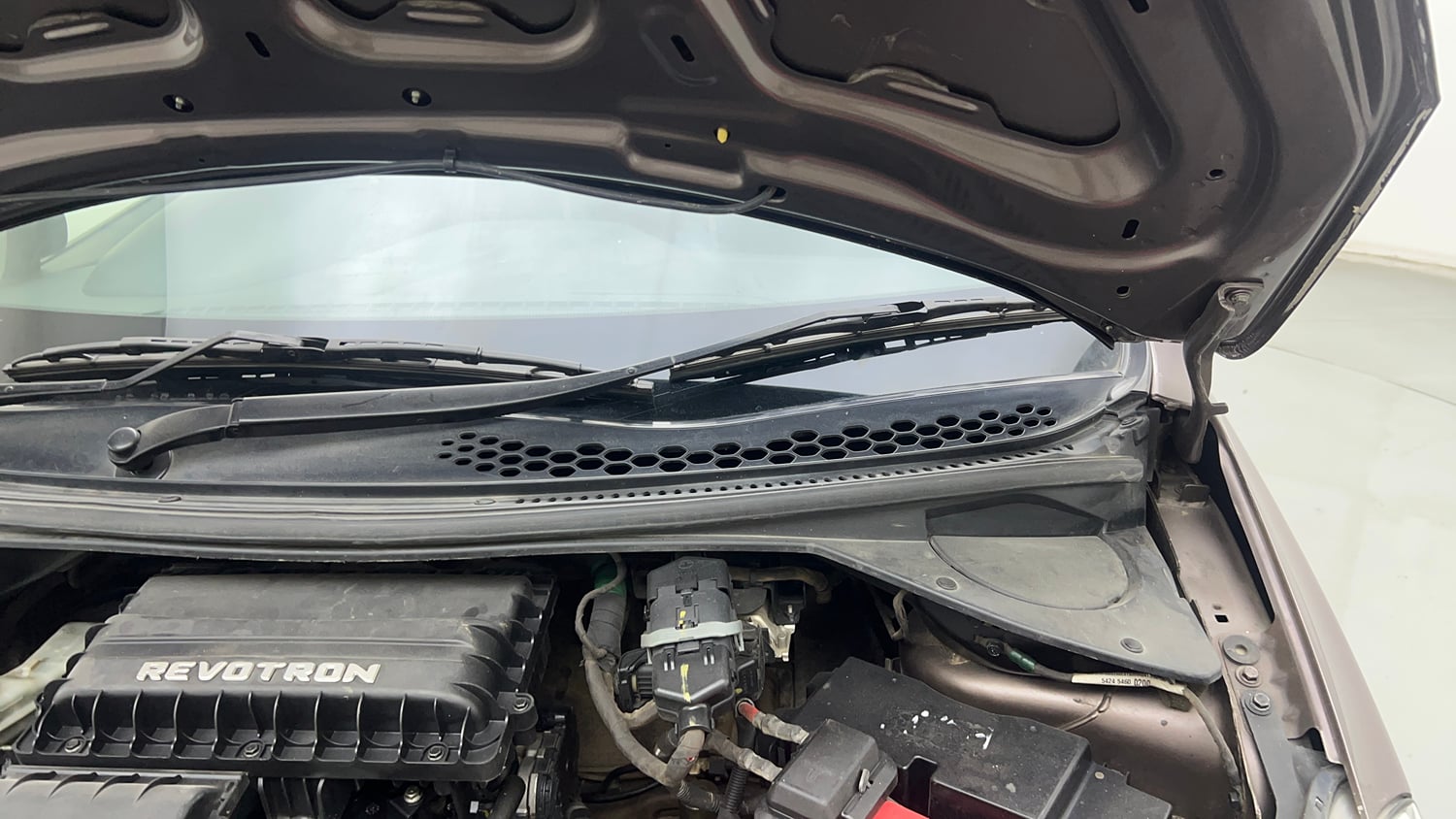 Used 2017 Tata Tiago Revotron XZ Petrol Manual engine ENGINE LEFT SIDE HINGE & APRON VIEW