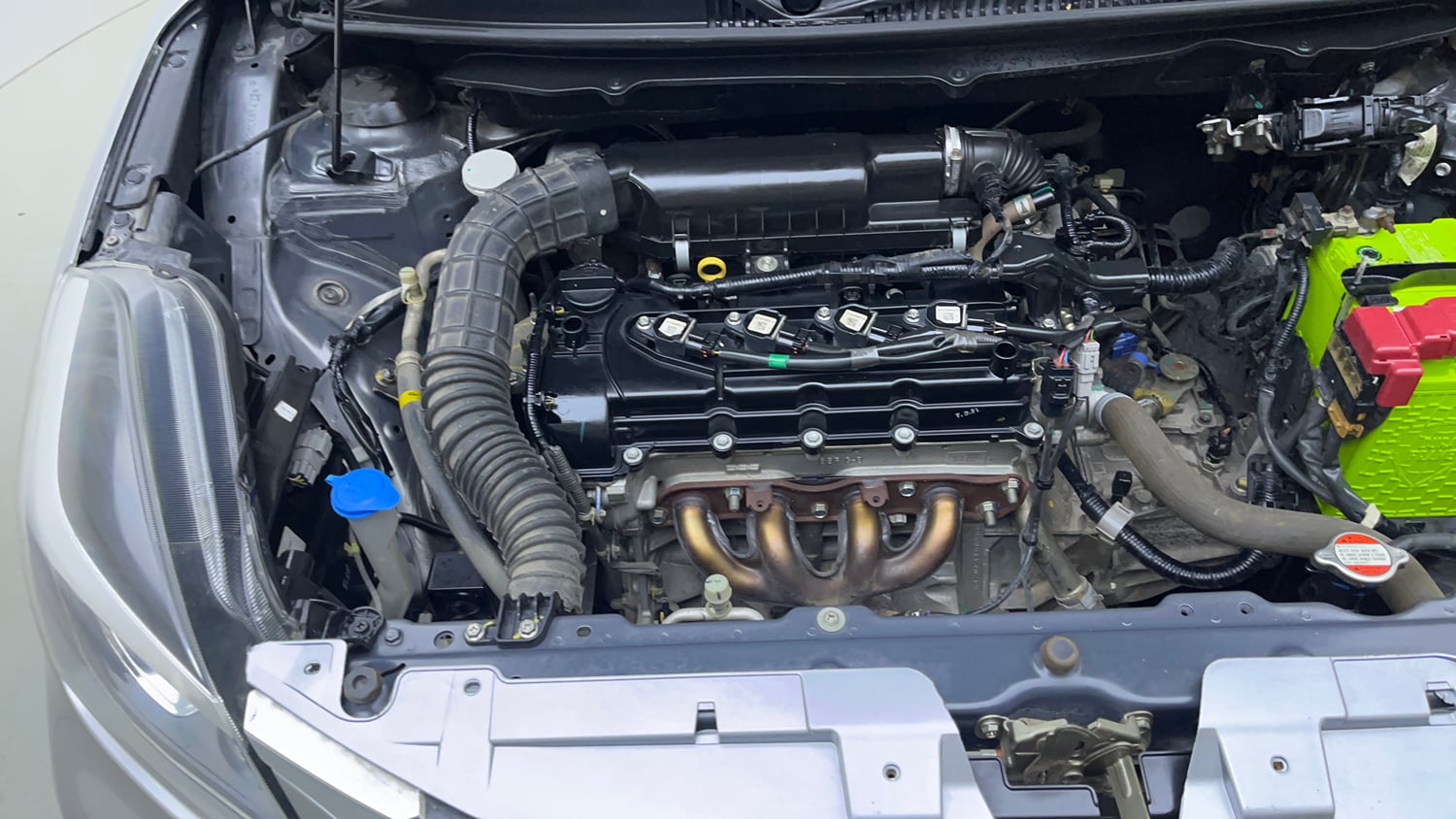 Used 2021 Maruti Suzuki Baleno Delta Petrol Manual engine ENGINE RIGHT SIDE VIEW