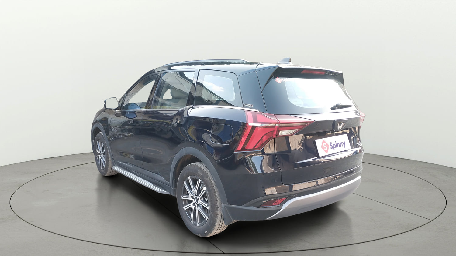 Used 2025 Mahindra XUV700 AX7 Luxury Pack Petrol AT 7 STR Petrol Automatic exterior LEFT REAR CORNER VIEW