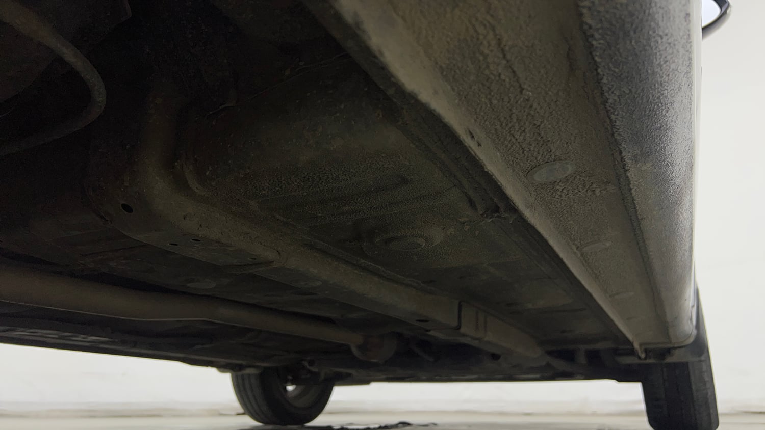 Used 2024 Hyundai Aura SX 1.2 CNG Cng Manual extra REAR RIGHT UNDERBODY VIEW