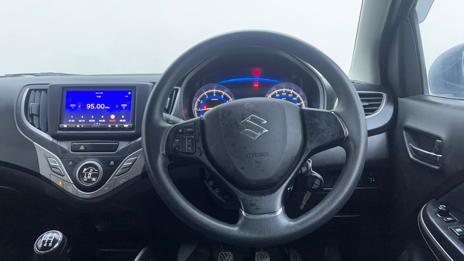 Used 2021 Maruti Suzuki Baleno Delta Petrol Manual interior STEERING VIEW