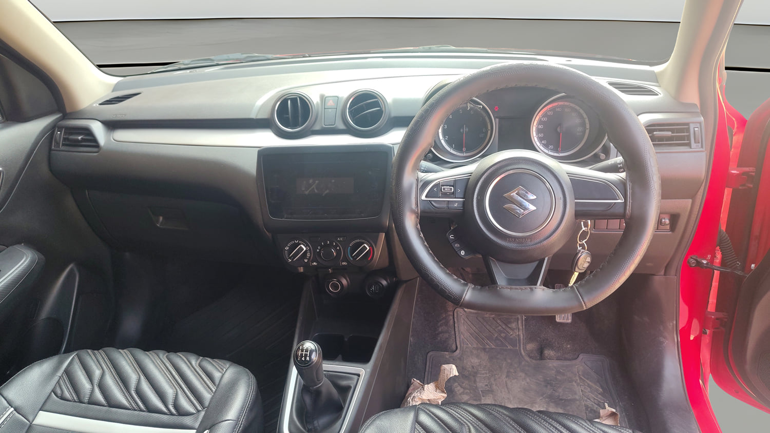 Used 2022 Maruti Suzuki Swift VXi Petrol Manual interior MUSIC SYSTEM & AC CONTROL VIEW