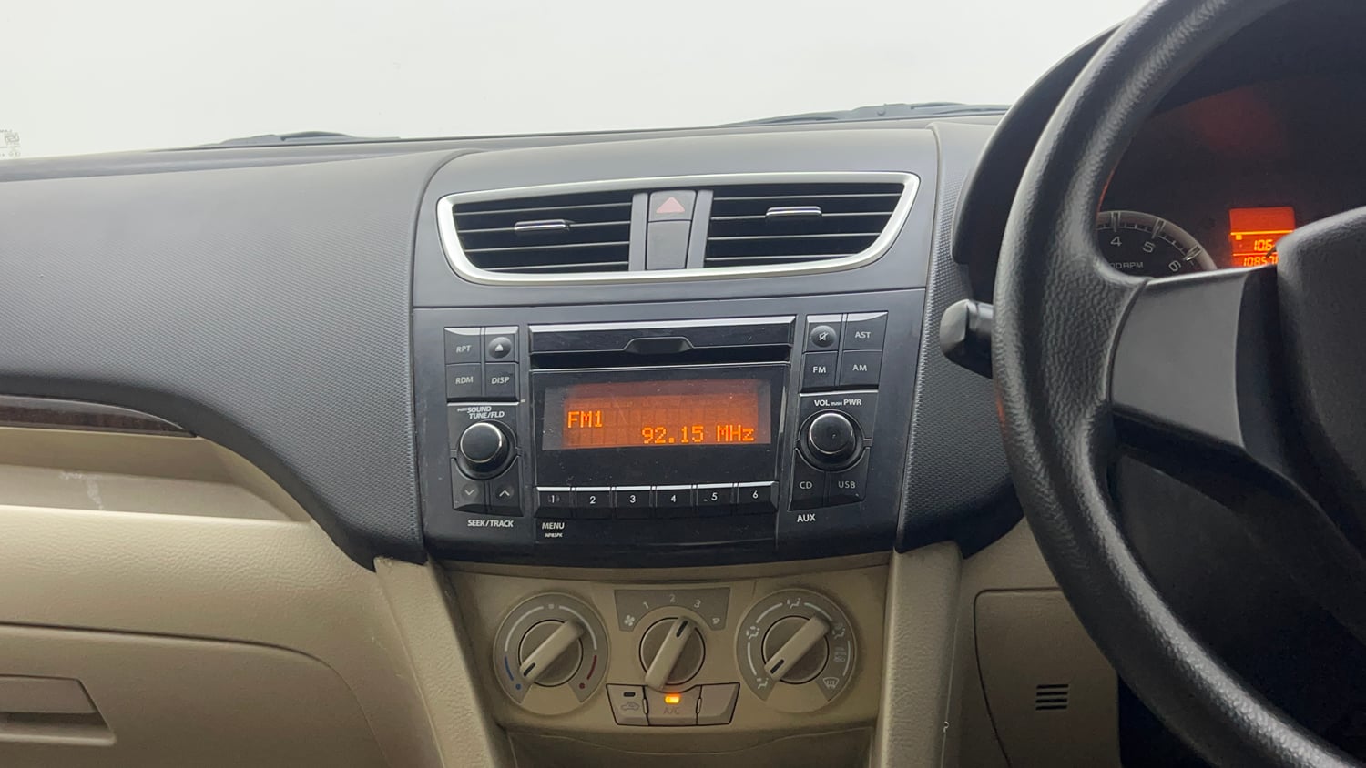 Used 2015 Maruti Suzuki Swift Dzire VXI Petrol Manual top_features Integrated (in-dash) music system