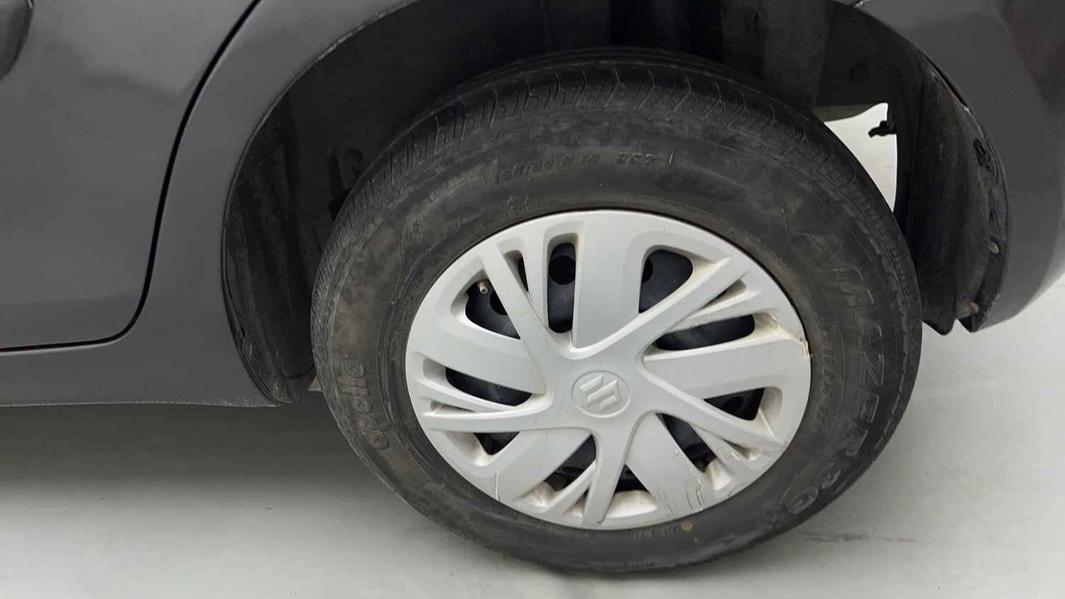 Used 2016 Maruti Suzuki Swift VXI (O) Petrol Manual tyres LEFT REAR TYRE RIM VIEW