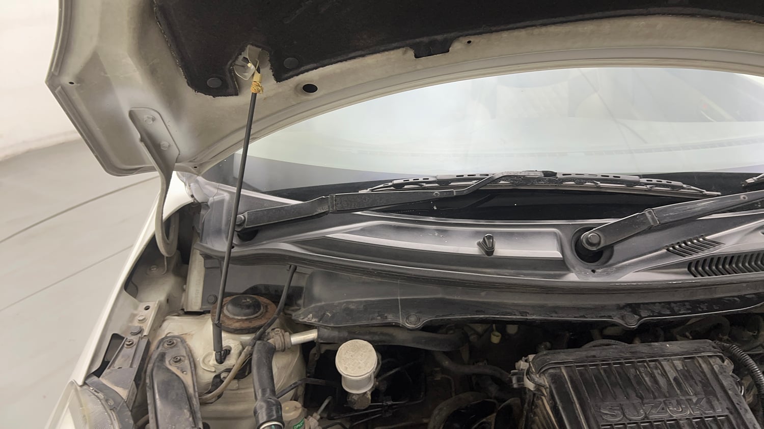 Used 2015 Maruti Suzuki Swift Dzire VXI Petrol Manual engine ENGINE RIGHT SIDE HINGE & APRON VIEW
