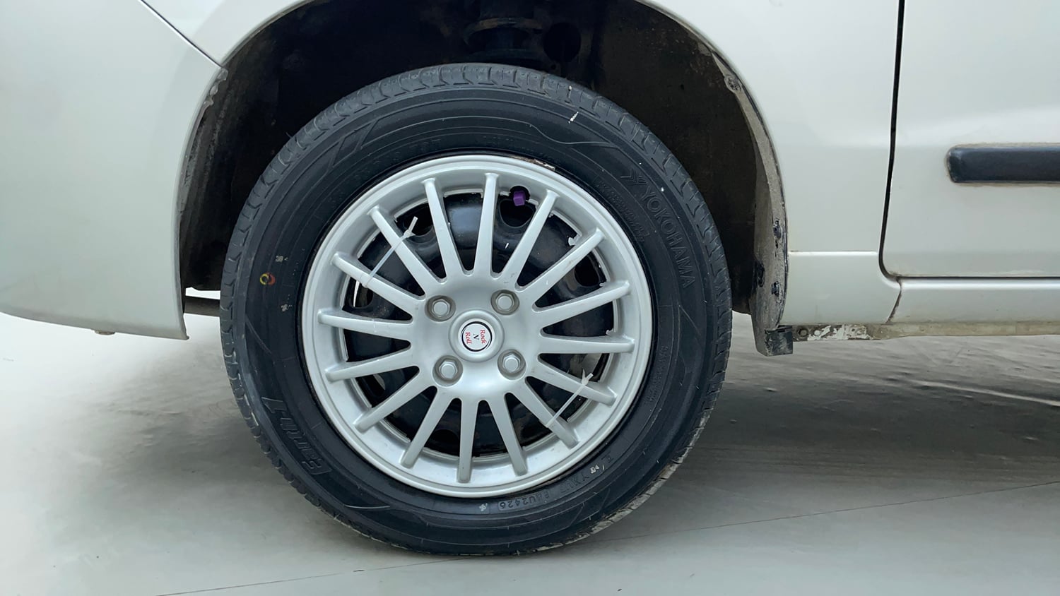 Used 2014 Maruti Suzuki Alto K10 VXi Petrol Manual tyres LEFT FRONT TYRE RIM VIEW
