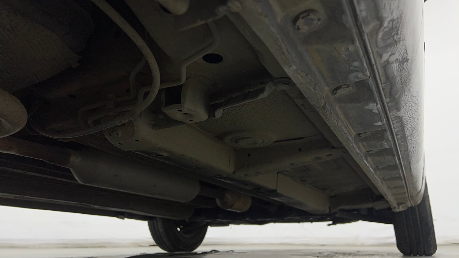 Used 2015 Maruti Suzuki Swift Dzire VXI Petrol Manual extra REAR RIGHT UNDERBODY VIEW