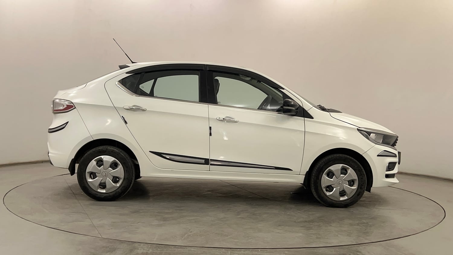 Used 2024 Tata Tigor XZ Petrol Manual exterior RIGHT SIDE VIEW