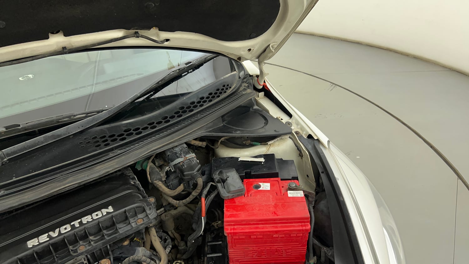 Used 2017 Tata Tiago Revotron XT Petrol Manual engine ENGINE LEFT SIDE HINGE & APRON VIEW