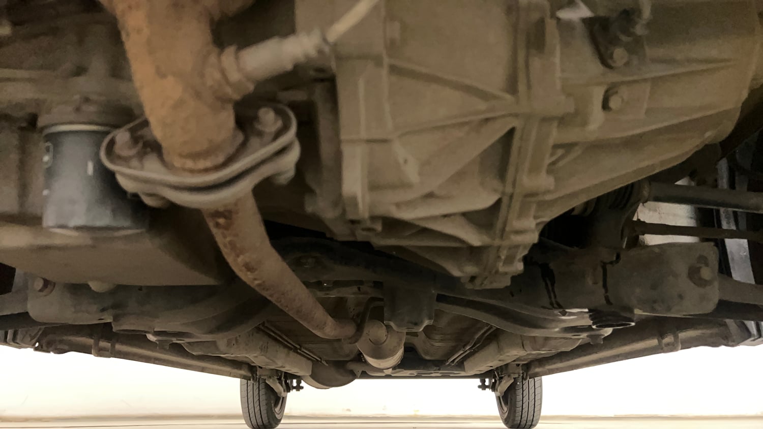 Used 2019 Maruti Suzuki Wagon R 1.0 VXI AMT Petrol Automatic extra FRONT LEFT UNDERBODY VIEW