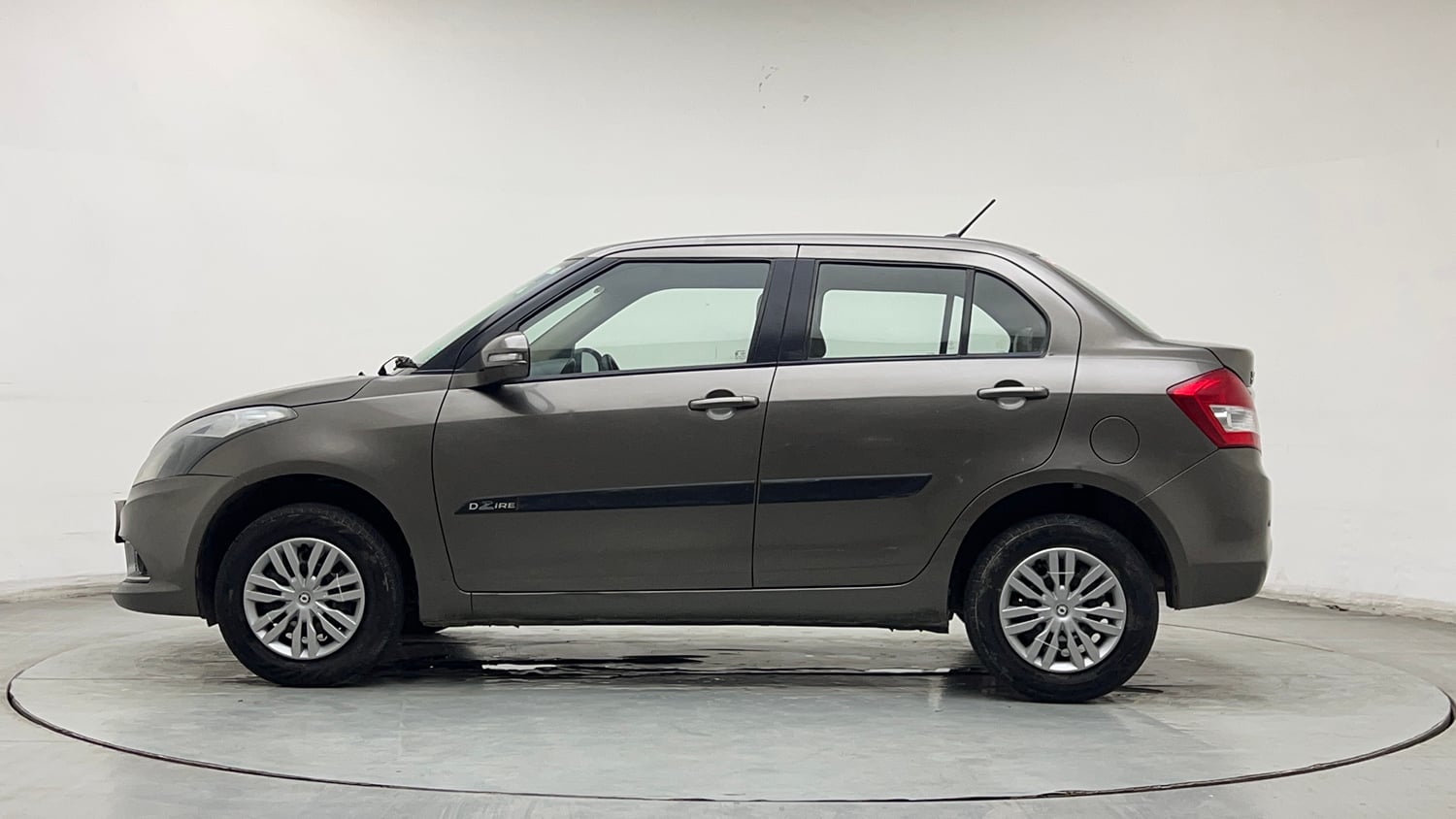 Used 2015 Maruti Suzuki Swift Dzire VXI Petrol Manual exterior LEFT SIDE VIEW