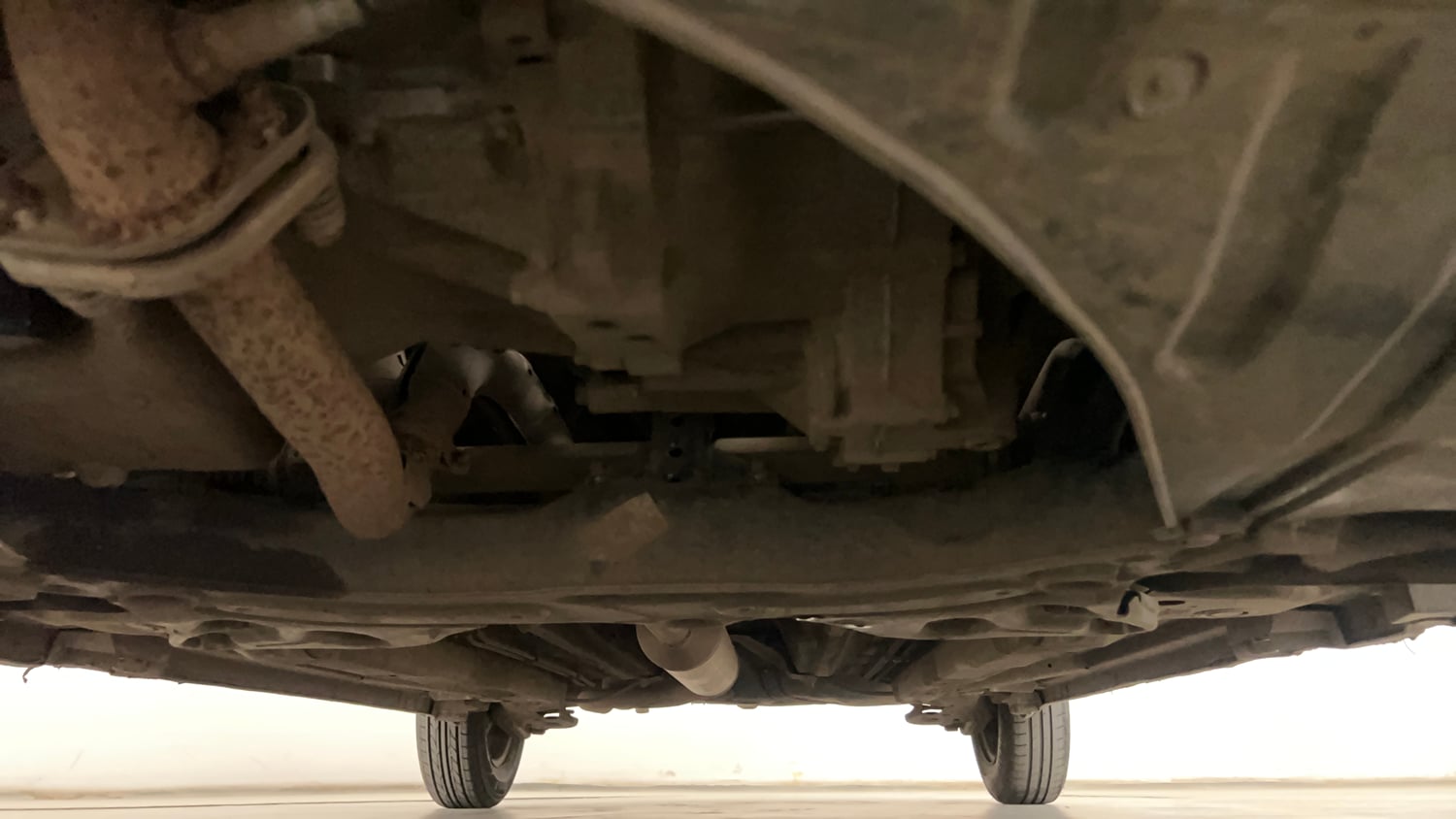Used 2012 Maruti Suzuki Swift Dzire VXI Petrol Manual extra FRONT LEFT UNDERBODY VIEW
