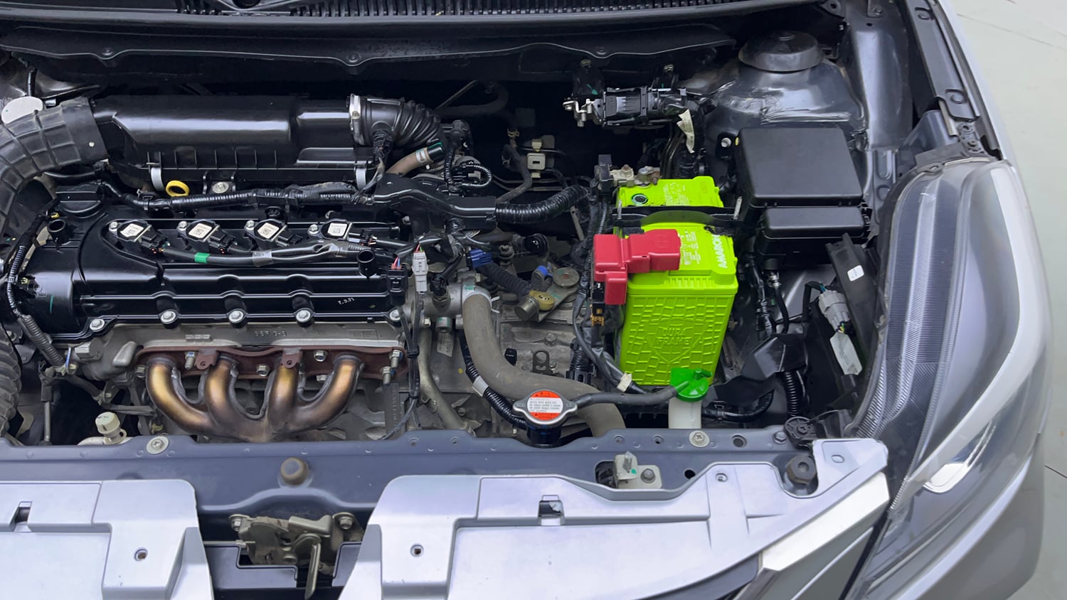 Used 2021 Maruti Suzuki Baleno Delta Petrol Manual engine ENGINE LEFT SIDE VIEW