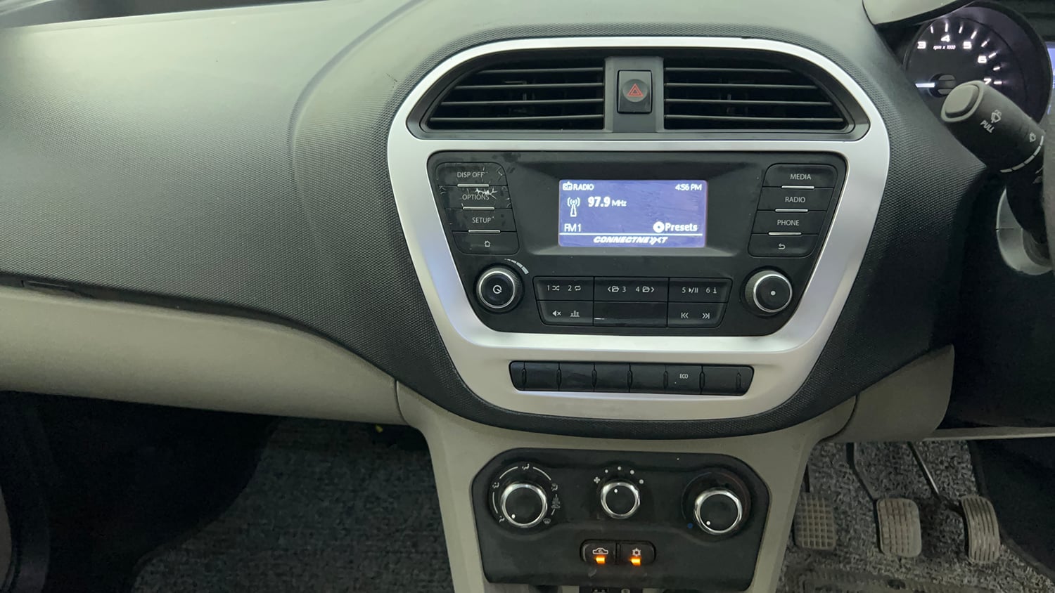 Used 2017 Tata Tiago Revotron XT Petrol Manual interior MUSIC SYSTEM & AC CONTROL VIEW