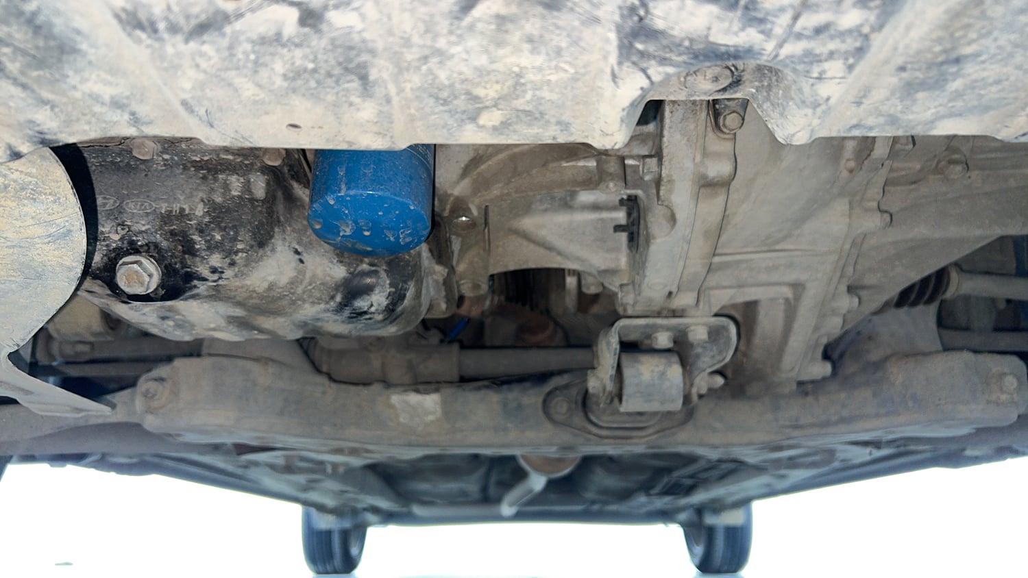 Used 2024 Hyundai Aura SX 1.2 CNG Cng Manual extra FRONT LEFT UNDERBODY VIEW