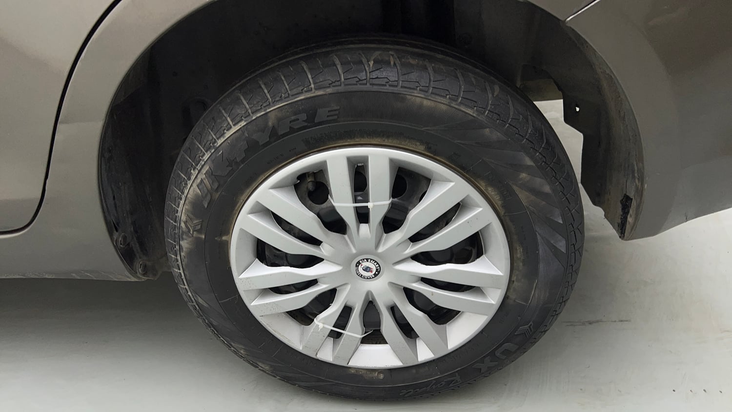 Used 2015 Maruti Suzuki Swift Dzire VXI Petrol Manual tyres LEFT REAR TYRE RIM VIEW