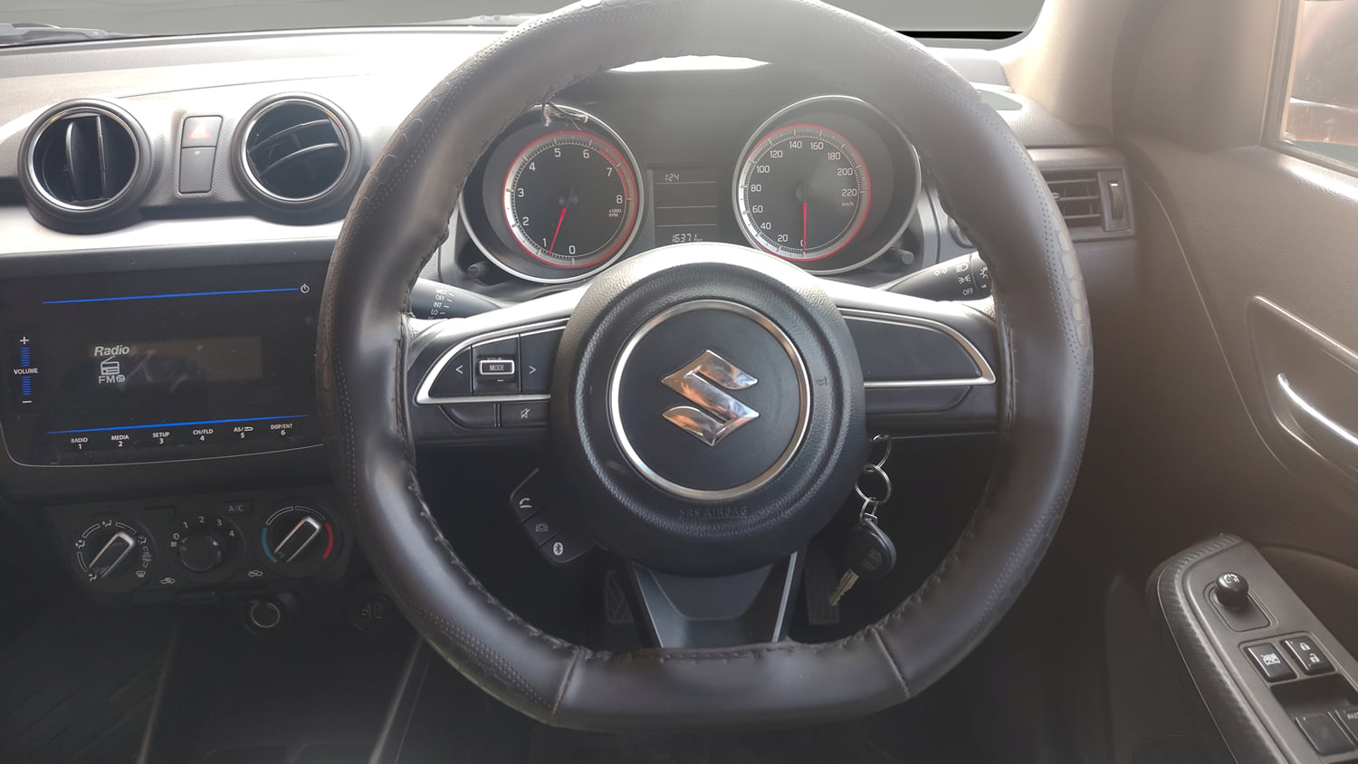 Used 2022 Maruti Suzuki Swift VXi Petrol Manual interior STEERING VIEW