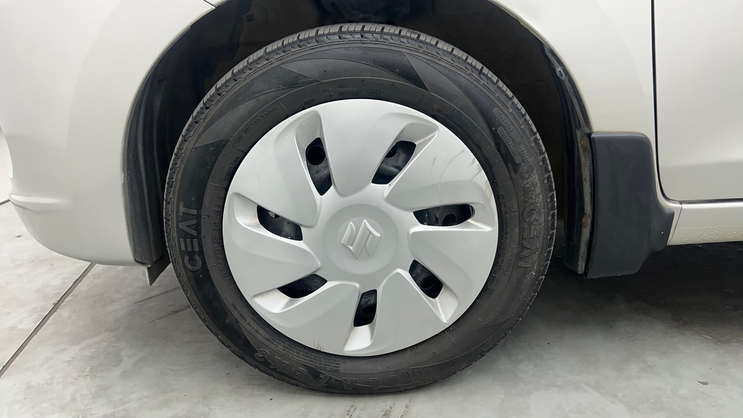 Used 2014 Maruti Suzuki Celerio VXi Petrol Manual tyres LEFT FRONT TYRE RIM VIEW