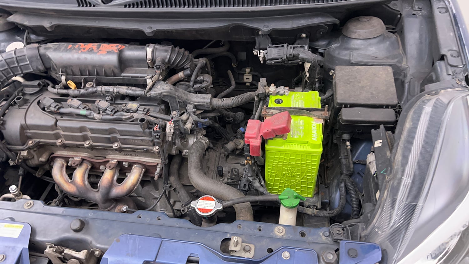 Used 2019 Maruti Suzuki Baleno Delta Petrol Manual engine ENGINE LEFT SIDE VIEW