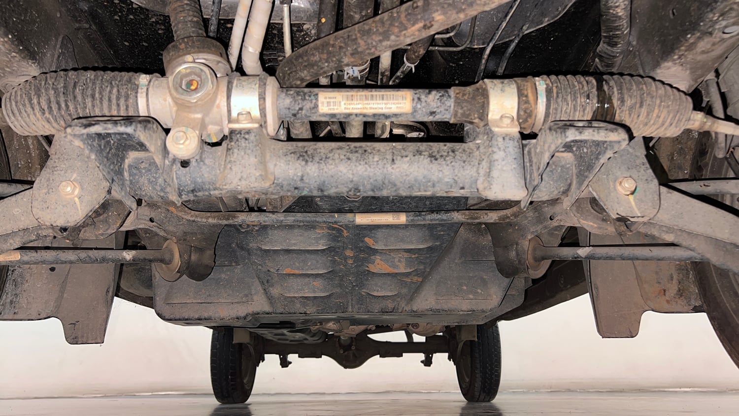 Used 2024 Maruti Suzuki Eeco 5 STR AC Petrol Manual extra FRONT LEFT UNDERBODY VIEW