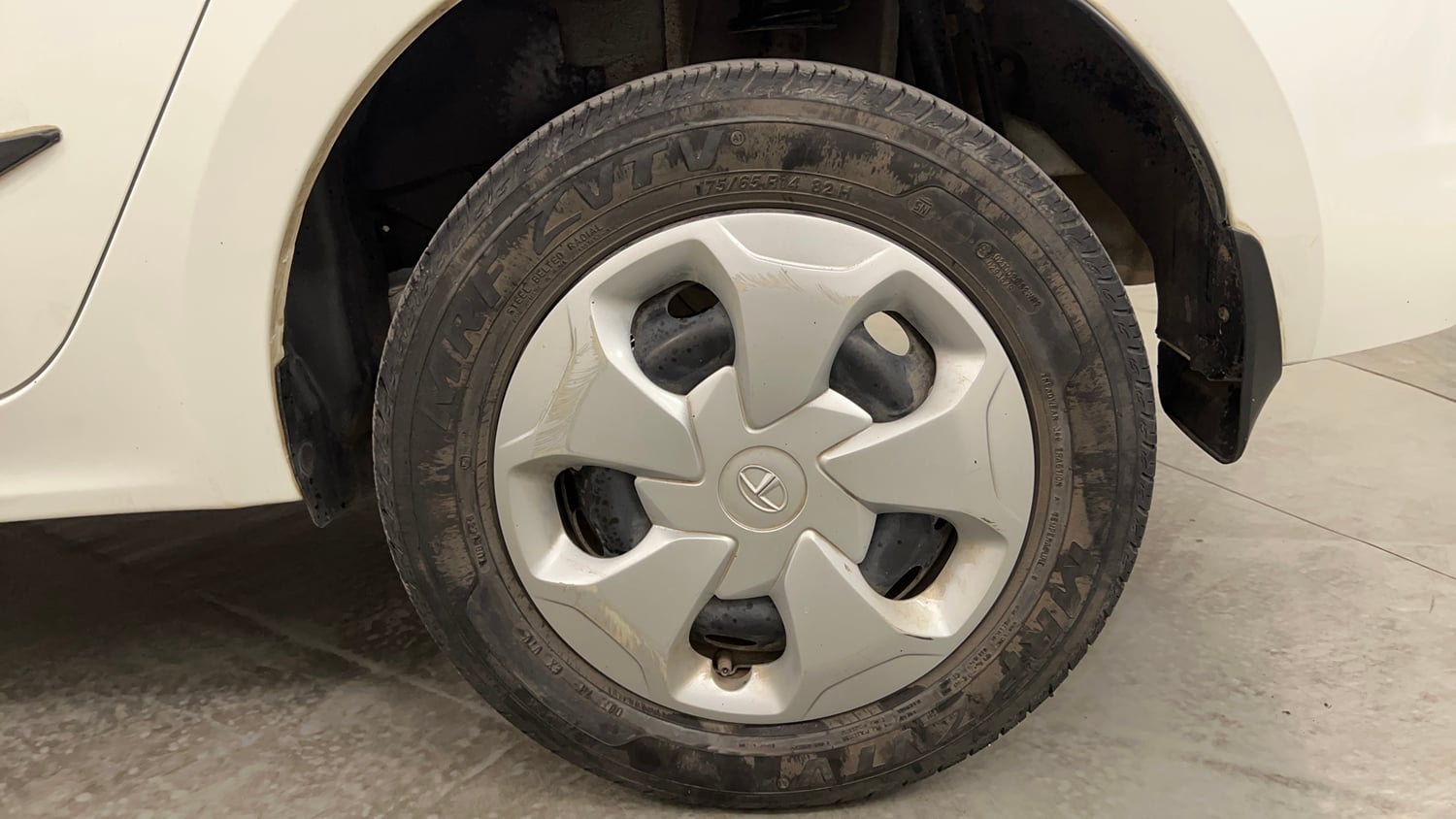 Used 2024 Tata Tigor XZ Petrol Manual tyres LEFT REAR TYRE RIM VIEW