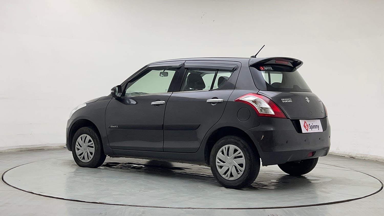 Used 2016 Maruti Suzuki Swift VXI (O) Petrol Manual exterior LEFT REAR CORNER VIEW