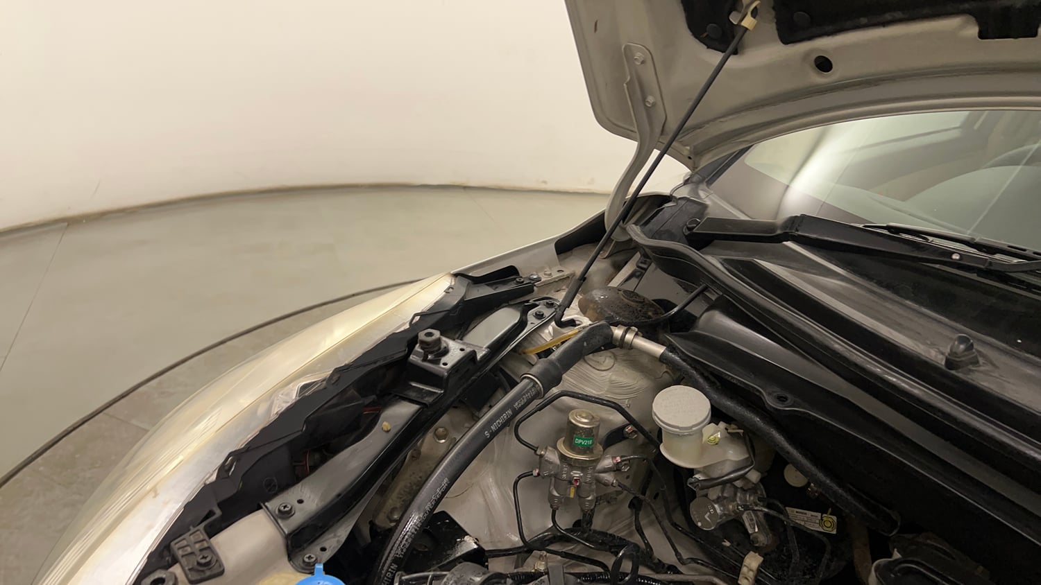 Used 2012 Maruti Suzuki Swift Dzire VXI Petrol Manual engine ENGINE RIGHT SIDE HINGE & APRON VIEW