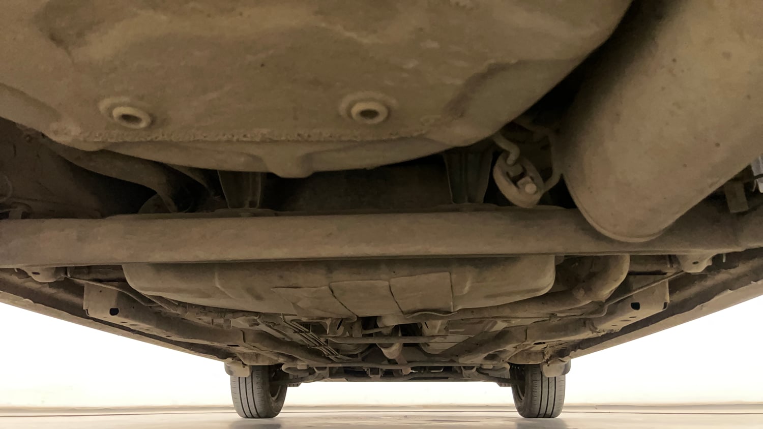 Used 2024 Tata Tigor XZ Petrol Manual extra REAR UNDERBODY VIEW (TAKEN FROM REAR)