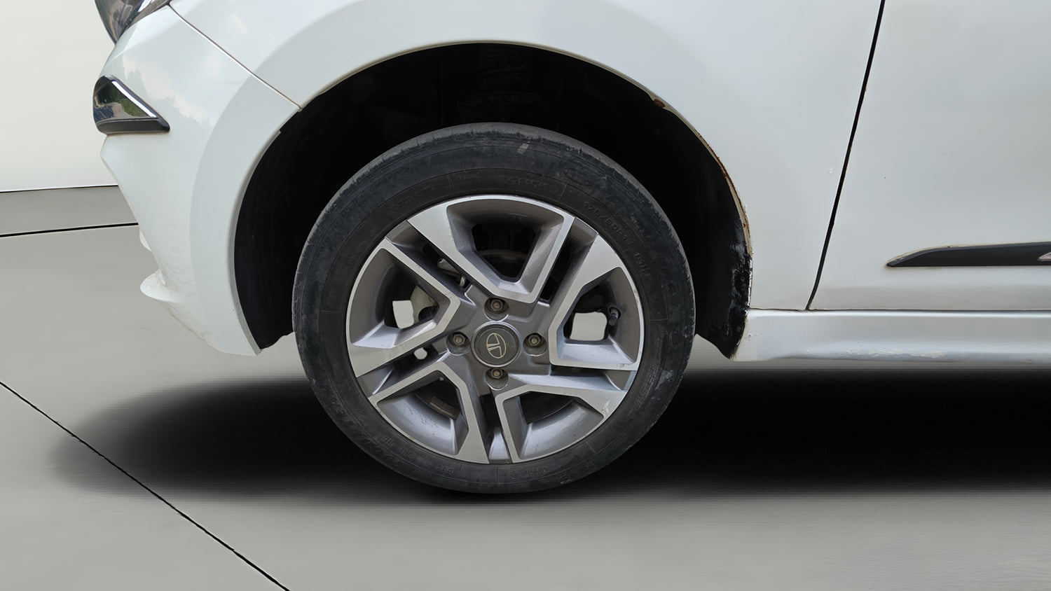 Used 2023 Tata Tigor XZ Plus Leatherette Pack Petrol Manual tyres LEFT FRONT TYRE RIM VIEW