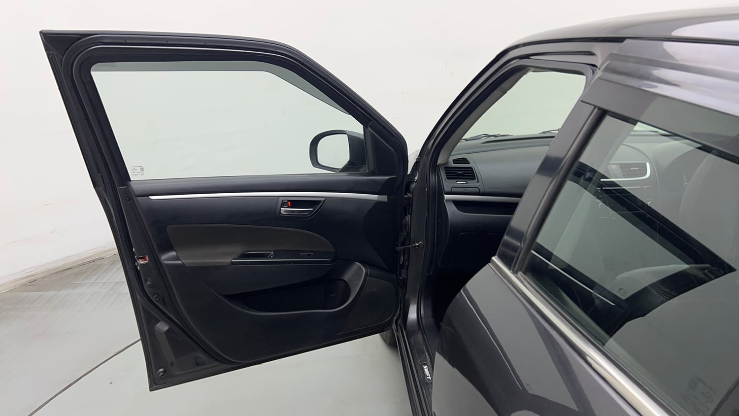Used 2016 Maruti Suzuki Swift VXI (O) Petrol Manual interior LEFT FRONT DOOR OPEN VIEW