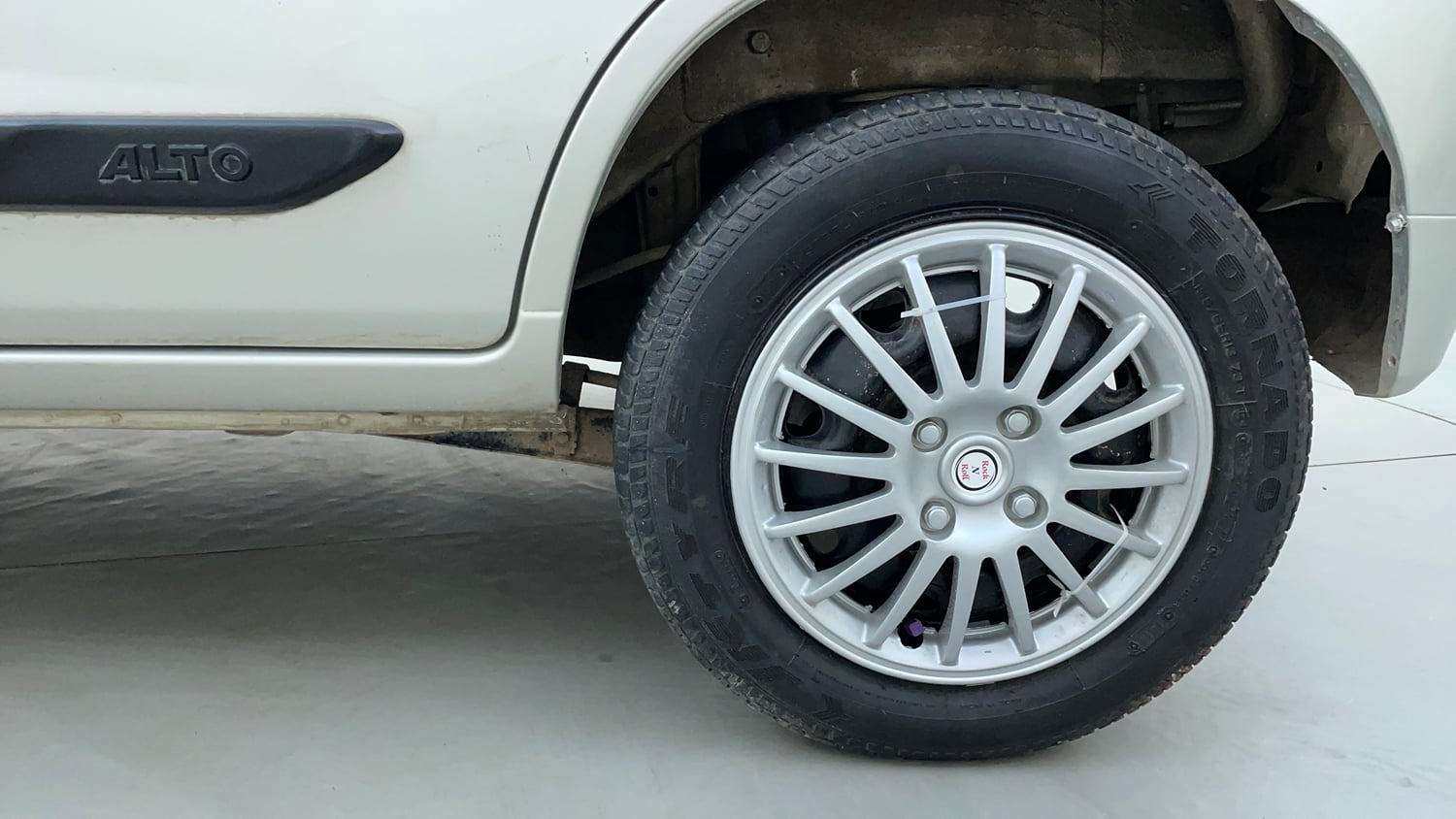 Used 2014 Maruti Suzuki Alto K10 VXi Petrol Manual tyres LEFT REAR TYRE RIM VIEW