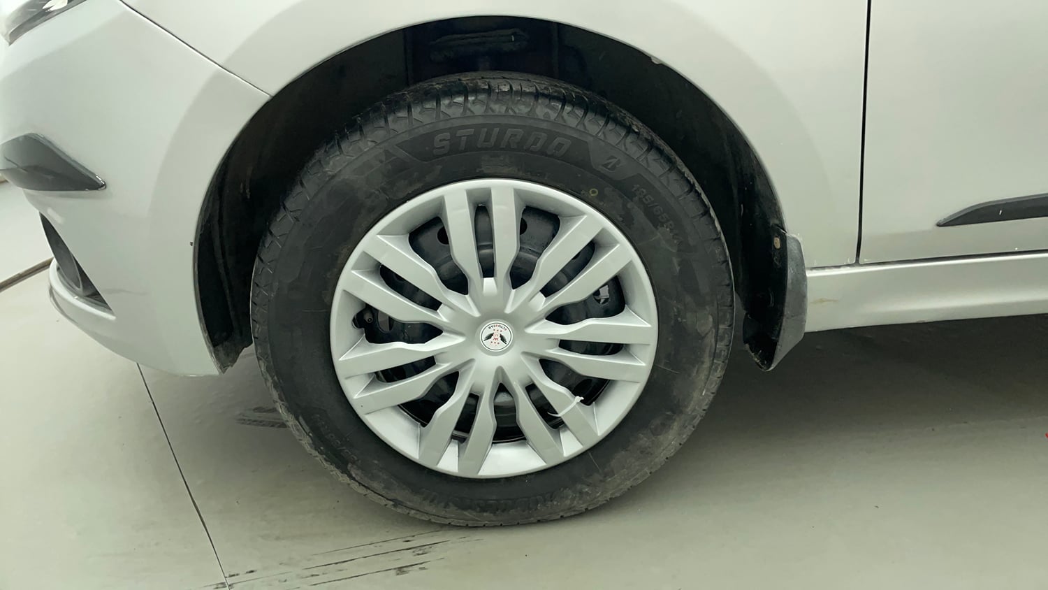 Used 2017 Tata Tiago Revotron XTA Petrol Automatic tyres LEFT FRONT TYRE RIM VIEW