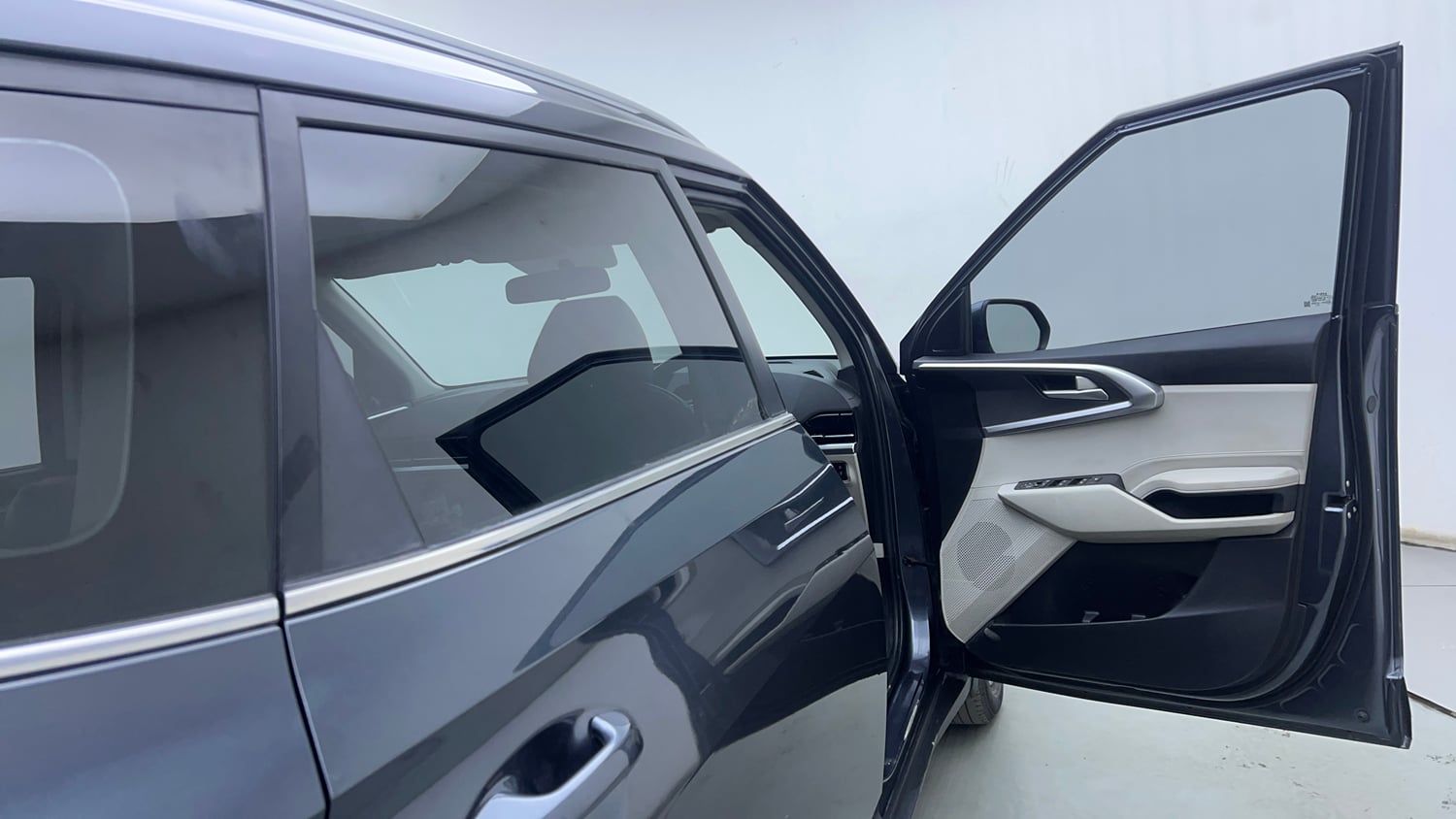 Used 2023 Kia Carens Prestige Plus 1.4 Petrol MT 7 STR Petrol Manual interior RIGHT FRONT DOOR OPEN VIEW