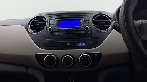 Used 2016 Hyundai Grand i10 Magna 1.2 Kappa VTVT Petrol Manual interior MUSIC SYSTEM & AC CONTROL VIEW