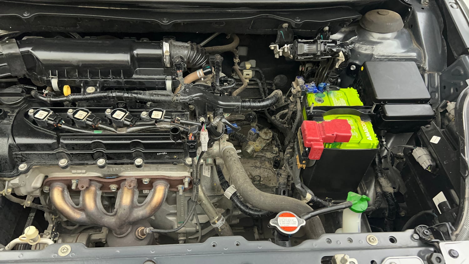 Used 2021 Maruti Suzuki Baleno Delta Petrol Manual engine ENGINE LEFT SIDE VIEW
