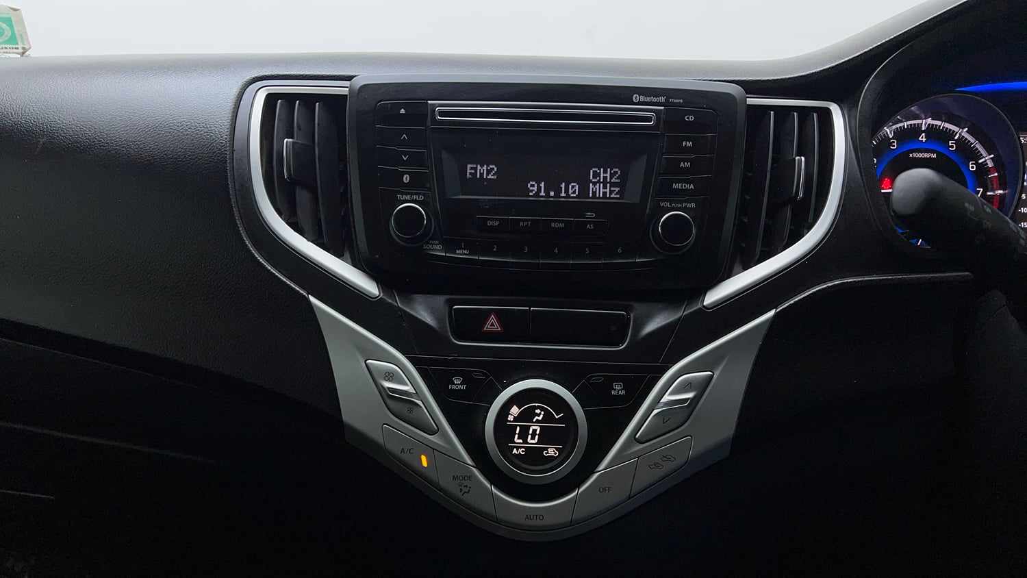 Used 2018 Maruti Suzuki Baleno Zeta 1.2 AT Petrol Automatic top_features Integrated (in-dash) music system