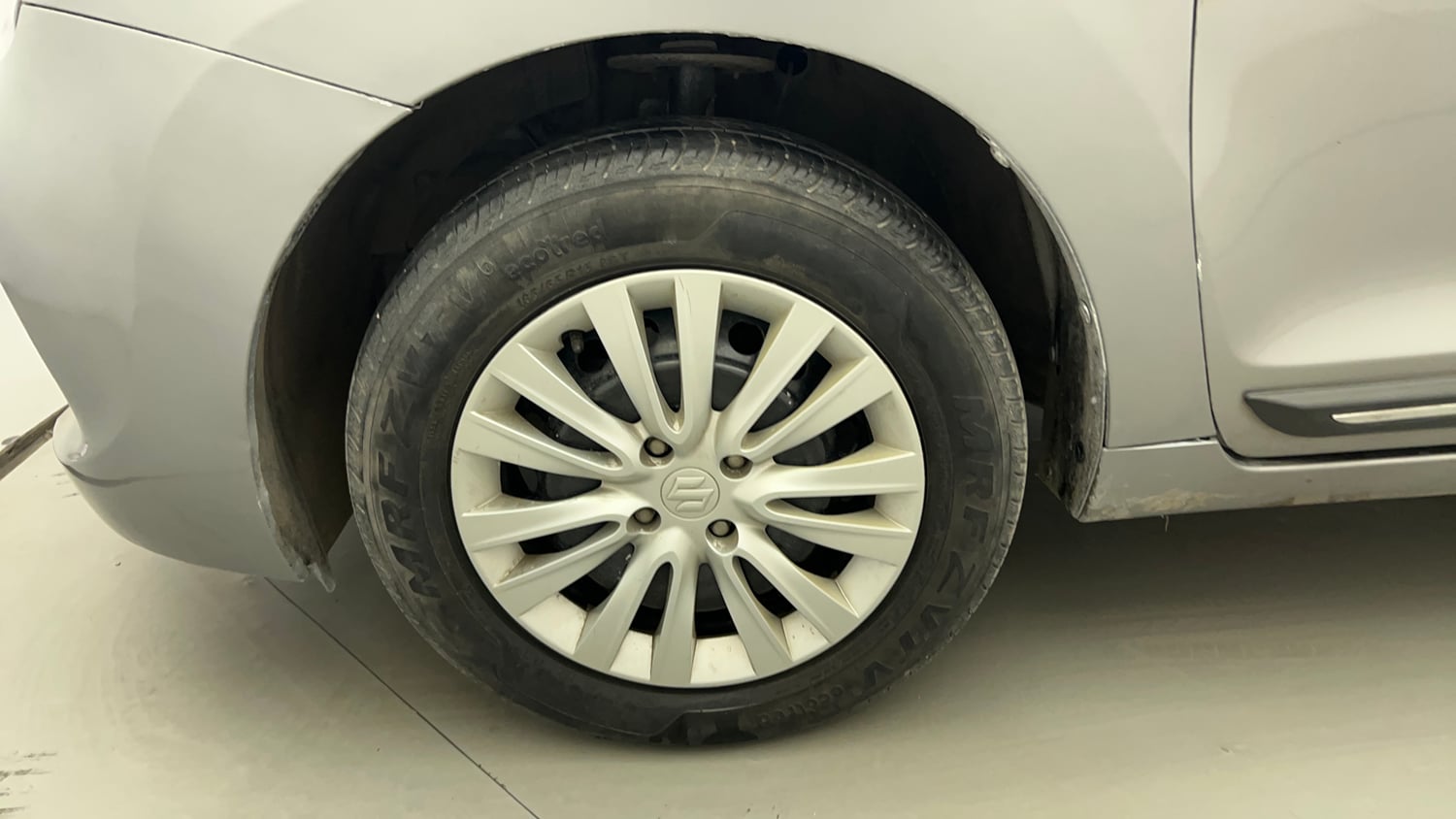Used 2021 Maruti Suzuki Baleno Delta Petrol Manual tyres LEFT FRONT TYRE RIM VIEW