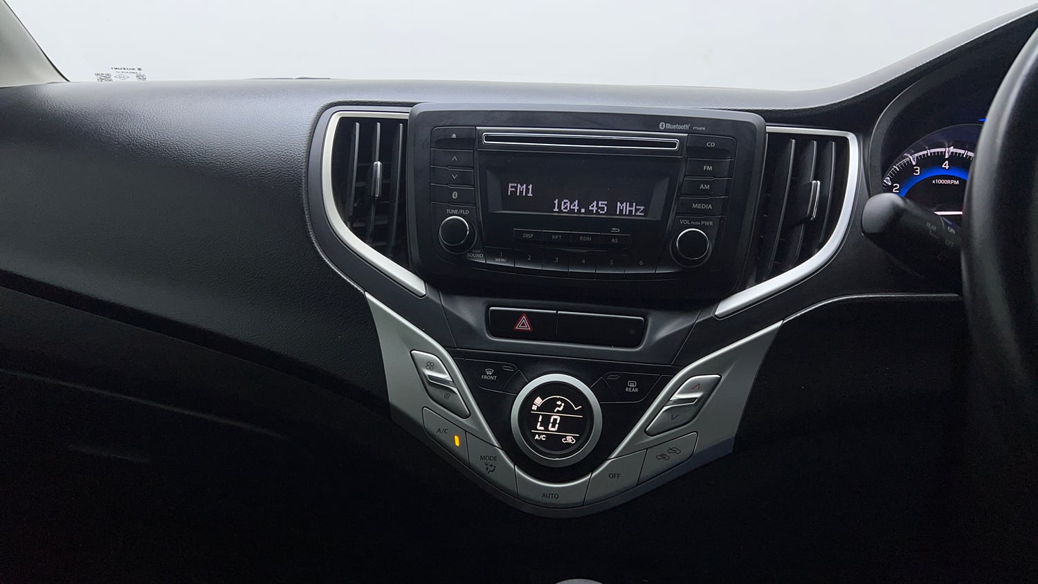 Used 2018 Maruti Suzuki Baleno Zeta 1.2 AT Petrol Automatic top_features Integrated (in-dash) music system